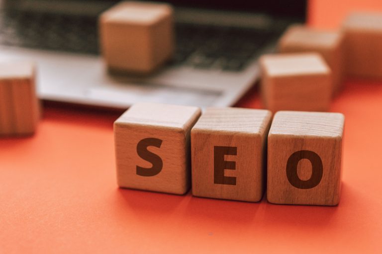 blocks sitting on a table with the letters seo showing